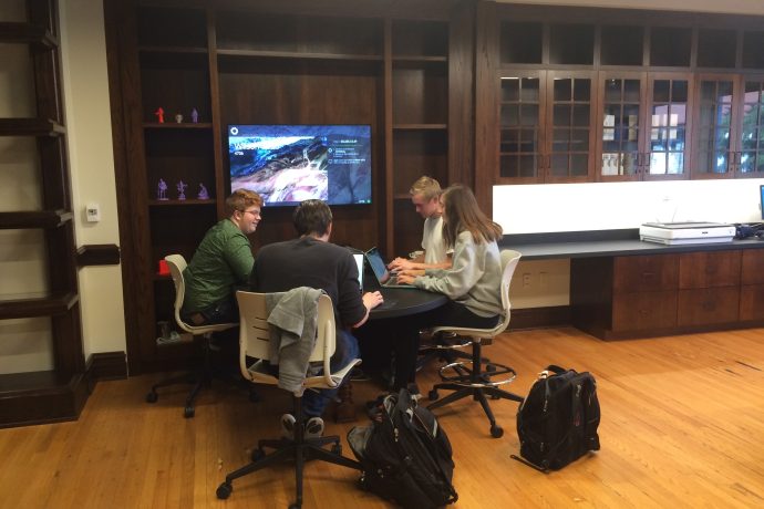 James Madison University students working at a table